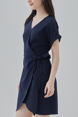 Meris Curved Hem Wrap Dress in Navy Blue