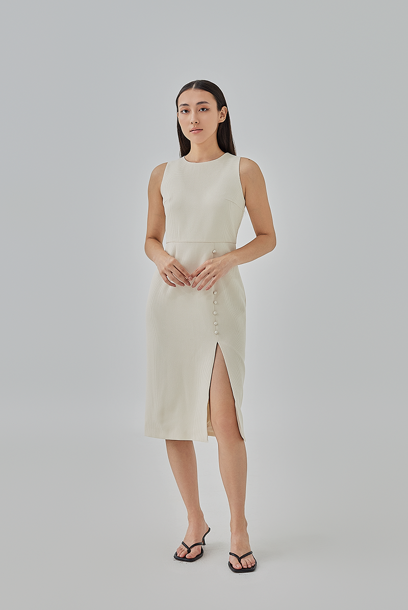 Laura Textured Pegged Dress in Beige